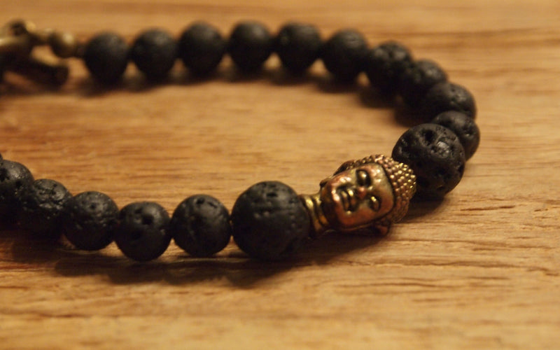 Mix of 6mm and 8mm lava stones with gold Buddha head charm bead bracelet