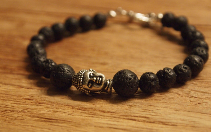 Mix of 6mm and 8mm lava stone beads with silver Buddha head bead bracelet