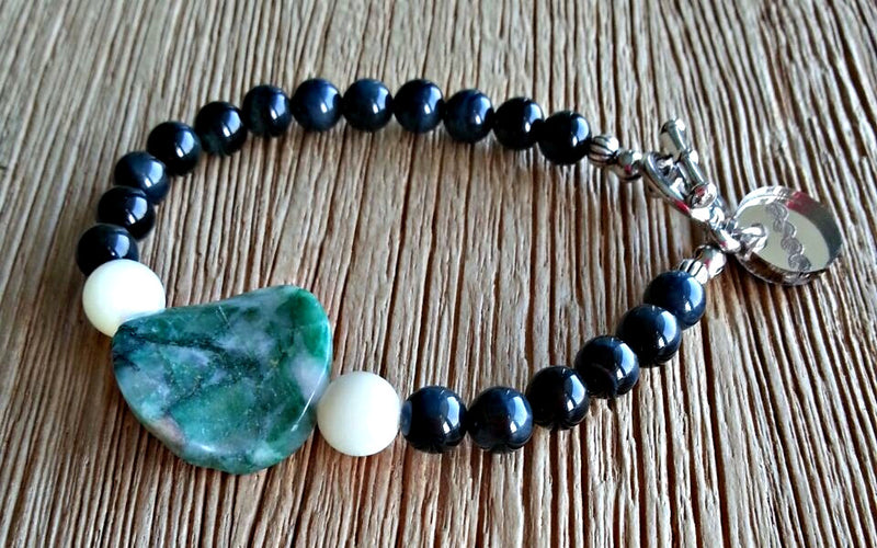 African Jade disc with 6mm blue tiger's eye and 8mm seawater mother of pearl beads. Beaded bracelets for men and women.