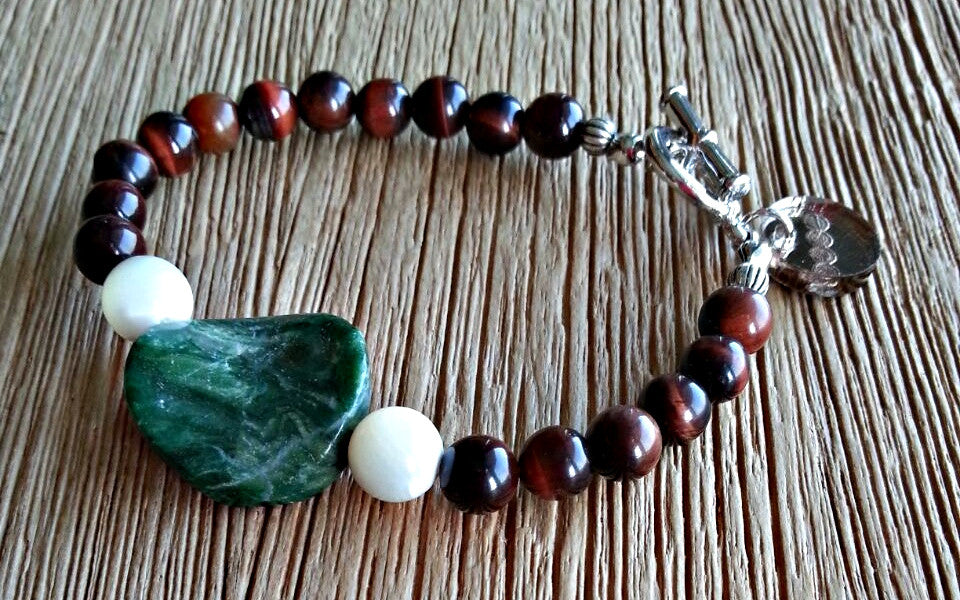 African Jade disc with 6mm red tiger's eye and 8mm seawater mother of pearl beads. Beaded bracelets for men and women.