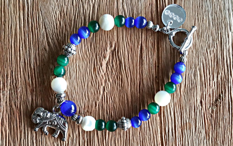 Silver elephant charm with blue and green cat's eye and seawater mother-of-pearl beaded bracelet