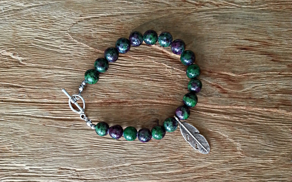 8mm ruby zoisite with silver feather charm bead bracelet