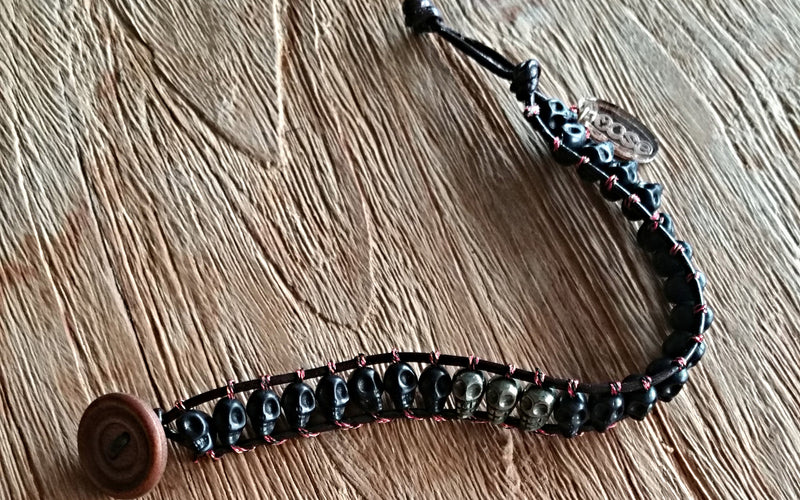 8mm black howlite and pyrite skulls leather cord-style bracelet