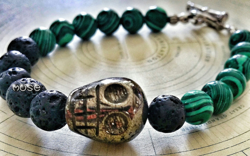 Rebelution Collection - Oversized Pyrite Skull with Malachite and Lava Stones